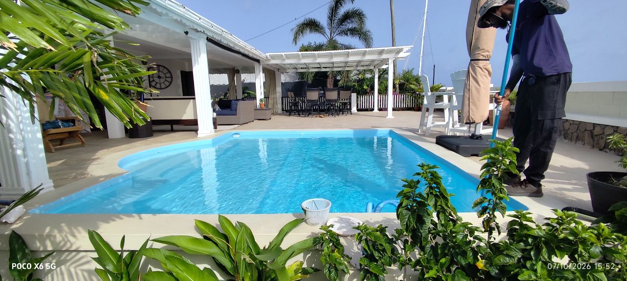 Clear blue pool water after treatment